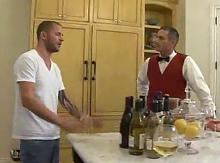 Sexy waiter turns on busty blonde and pleases her right on the kitchen table.