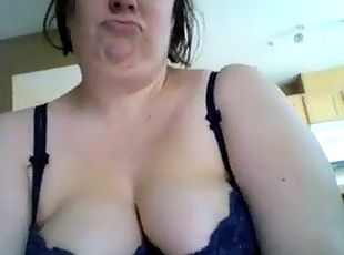 Busty teacher rubs her big soft tits