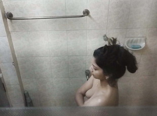 Sister takes a hot bath