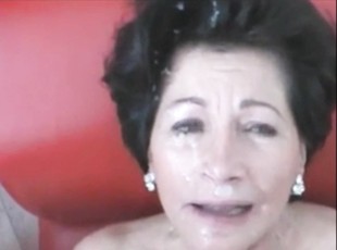 Sexy granny with heavy makeup exhibit on cam