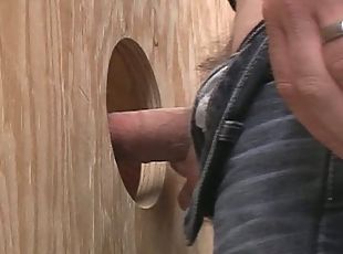 Swallowing a cock through the gloryhole